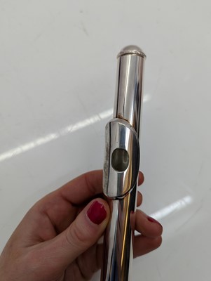 Lot 223 - Two Trevor J. James silver plated flutes