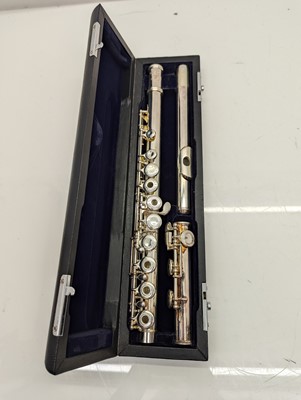Lot 223 - Two Trevor J. James silver plated flutes