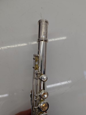 Lot 223 - Two Trevor J. James silver plated flutes