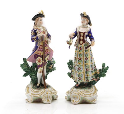 Lot 66 - A pair of porcelain figures