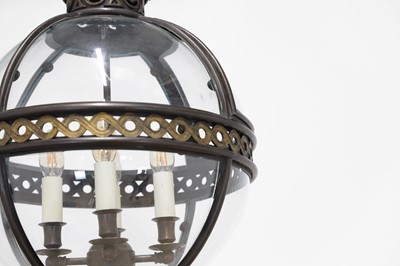 Lot 95 - A pair of bronze, gilt-brass and glass 'Original' globe lanterns by Jamb London