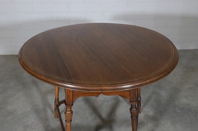 Lot 5 - A rosewood and ivory-inlaid circular centre table