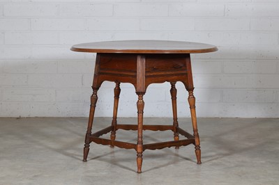 Lot 5 - A rosewood and ivory-inlaid circular centre table