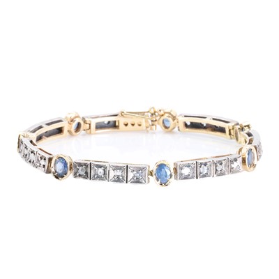 Lot 203 - A Continental silver and gold, sapphire and diamond line bracelet