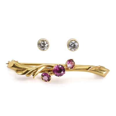 Lot 1311 - A pair of diamond stud earrings and a brooch