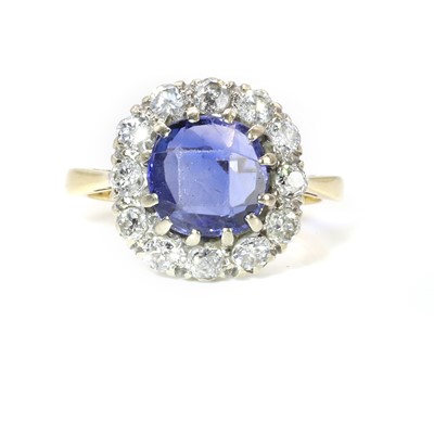 Lot 62 - A sapphire and diamond cluster ring