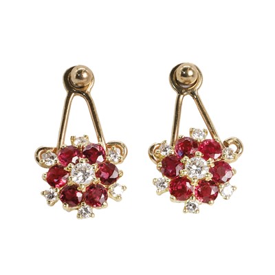 Lot 1170 - A pair of ruby and diamond cluster earrings