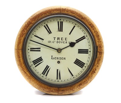 Lot 169 - An oak wall clock