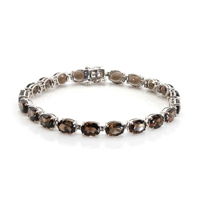 Lot 1235 - A 9ct white gold single row smoky quartz bracelet