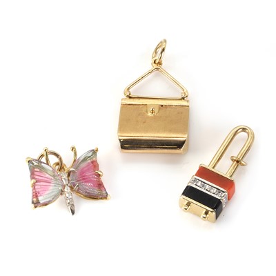 Lot 1318 - A coral, onyx and diamond padlock charm or pendant