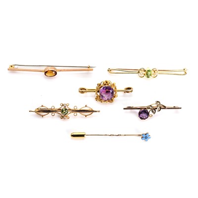 Lot 1340 - A collection of five bar brooches and a stick pin