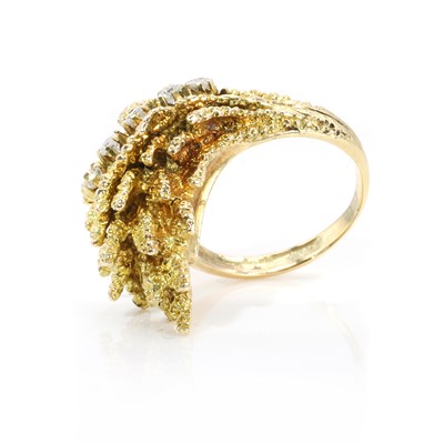 Lot 110 - A leaf design diamond set ring
