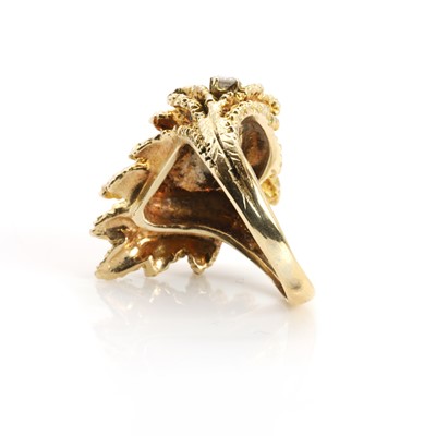 Lot 110 - A leaf design diamond set ring