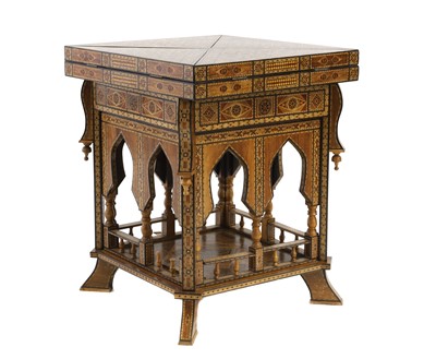 Lot 684 - A Damascus parquetry inlaid games table