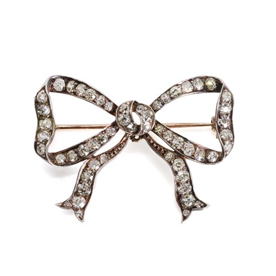 Lot 18 - A Victorian diamond set bow brooch