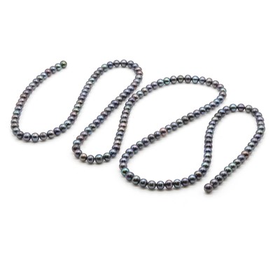 Lot 1256 - A long strand of grey pearls