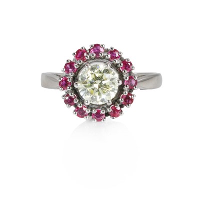 Lot 261 - †A ruby and fancy coloured diamond cluster ring