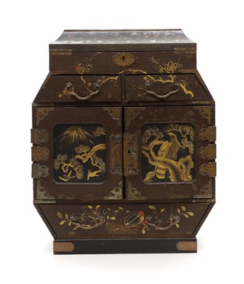 Lot 161 - A Japanese lacquer table cabinet