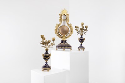 Lot 106 - A Louis XVI-style porcelain and gilt-metal clock garniture