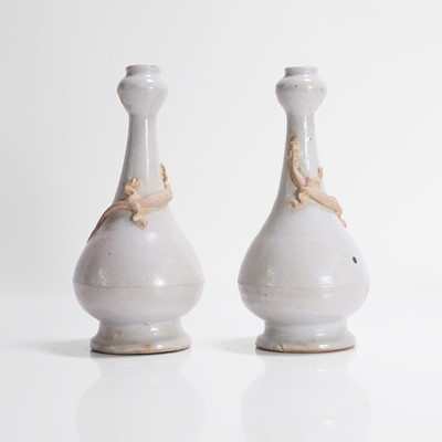 Lot 482 - A pair of Chinese white-glazed vases