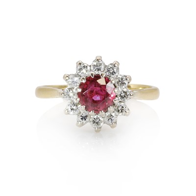 Lot 184 - An 18ct gold ruby and diamond cluster ring