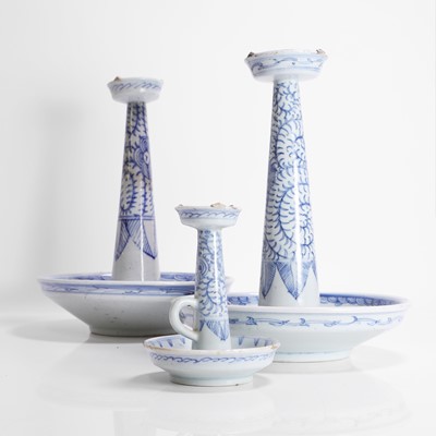 Lot 361 - A collection of three Chinese blue and white candlesticks