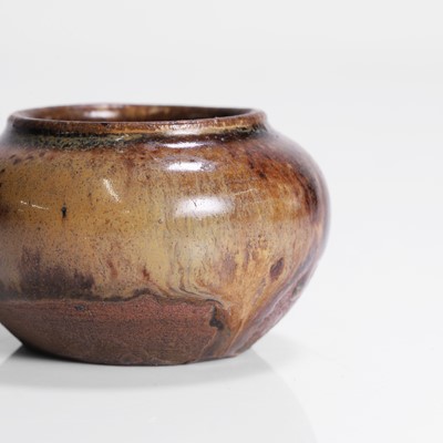 Lot 247 - A Japanese earthenware jarlet