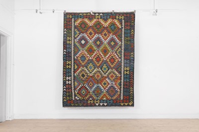 Lot 618 - A flat-weave kilim wool rug