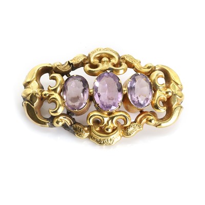 Lot 1017 - A Victorian amethyst three stone brooch/pendant