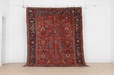 Lot 356 - A Heriz wool carpet