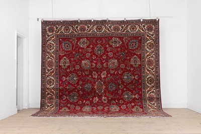 Lot 497 - A Tabriz wool carpet