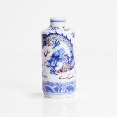 Lot 165 - A Chinese copper-red and underglaze blue snuff bottle