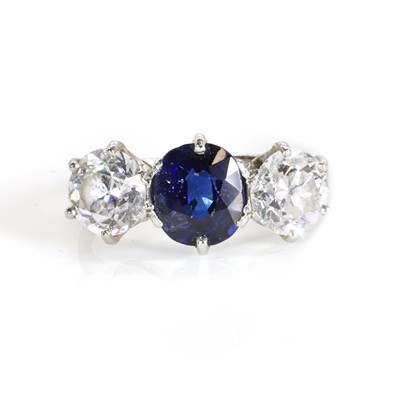 Lot 209 - A sapphire and diamond three stone ring