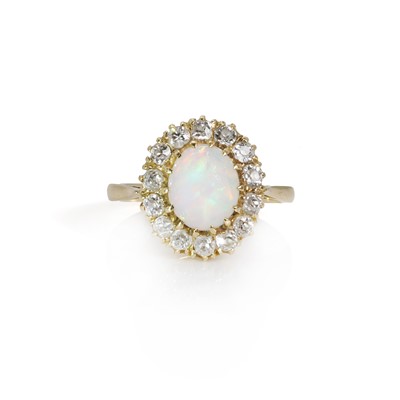 Lot 124 - An opal and diamond cluster ring