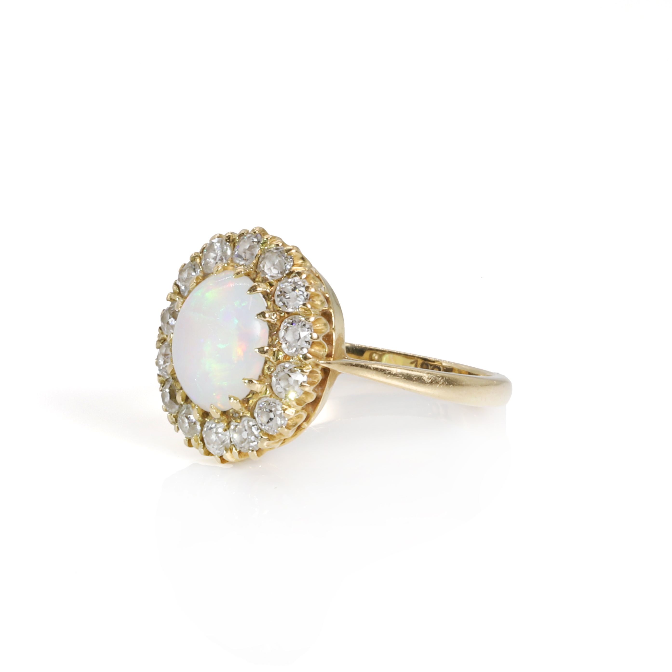 Lot 124 An opal and diamond cluster ring,