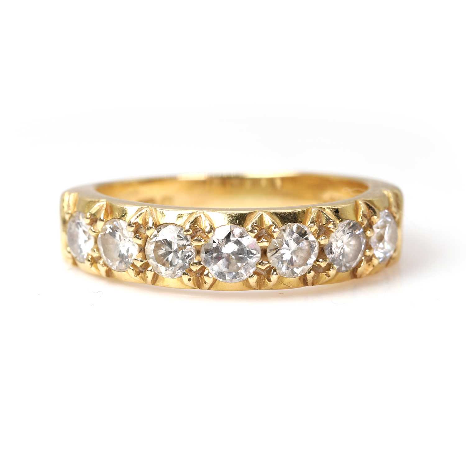 Lot 92 - An 18ct gold diamond half eternity ring