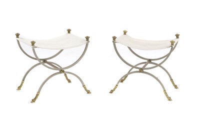 Lot 664 - A pair of polished steel window seats