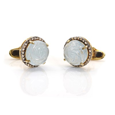 Lot 1430 - A pair of aquamarine and diamond cufflinks