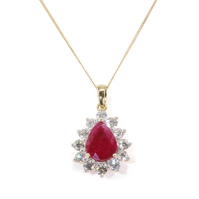 Lot 187 - A ruby and diamond drop shaped cluster pendant