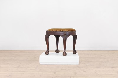 Lot 472 - A George II-style carved walnut stool