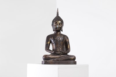 Lot 121 - A gilt-bronze Buddha