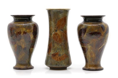 Lot 335 - A group of three Royal Doulton 'Autumnal Leaves' pottery vases