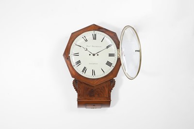 Lot 516 - A mahogany and rosewood octagonal drop-dial wall clock