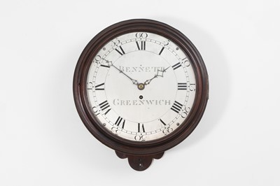 Lot 518 - A mahogany wall clock