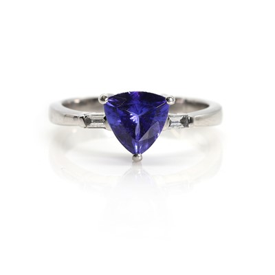 Lot 1238 - A platinum tanzanite and diamond ring, by Rhapsody