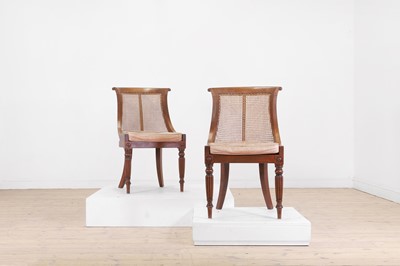 Lot 150 - A pair of George IV mahogany bergère library chairs