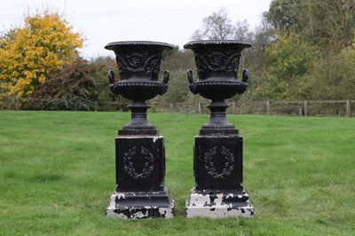 Lot 632 - A pair of Victorian cast iron garden urns