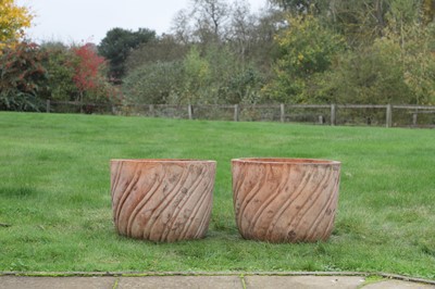 Lot 634 - A pair of terracotta planters