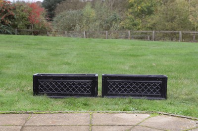 Lot 635 - A pair of cast fibreglass planters