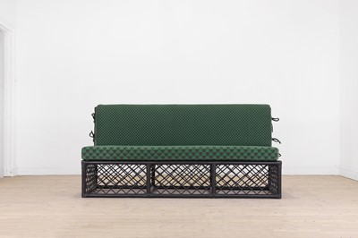 Lot 528 - An ebonised rattan ‘Hurlingham’ three-seater sofa by Soane